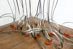 Akirasaurus (Detail View From Above) • Installation, Airplane Parts, Hoist Hooks, Shim Stock, R.A.M.S.E.S Recycled-Assembled-Metal-Surplus-Engineered-Scrap, 108 x 84 x 48-60 inches (274.32 x 213.36 x 121.92 cm) All dimensions slightly variable.